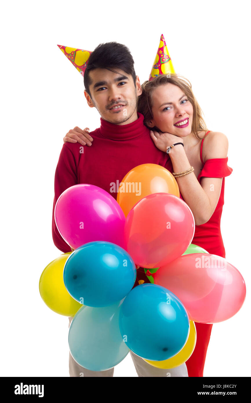 Young couple with balloons Stock Photo - Alamy