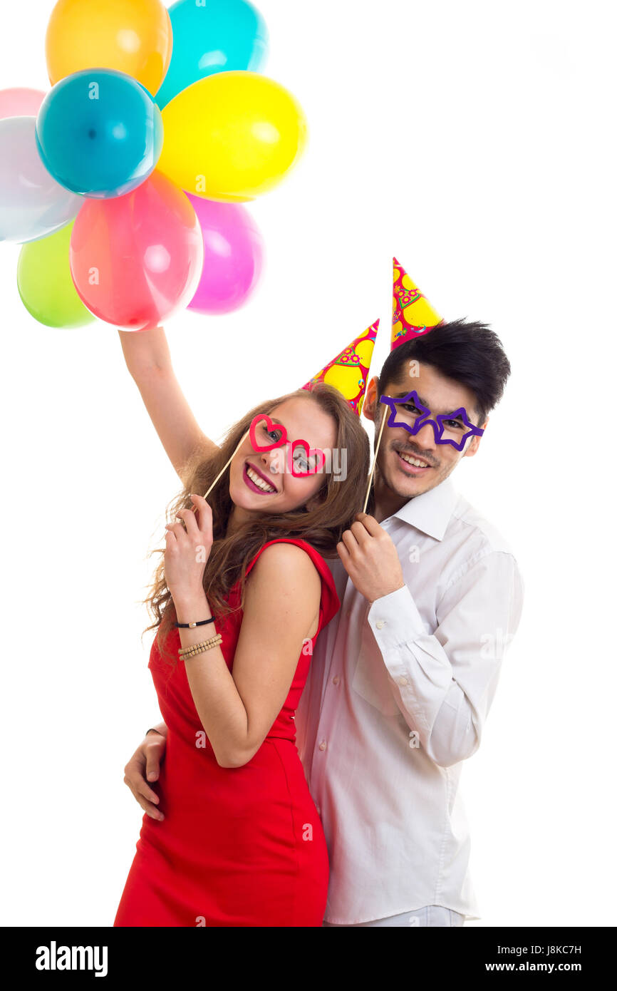 Young couple with balloons Stock Photo - Alamy
