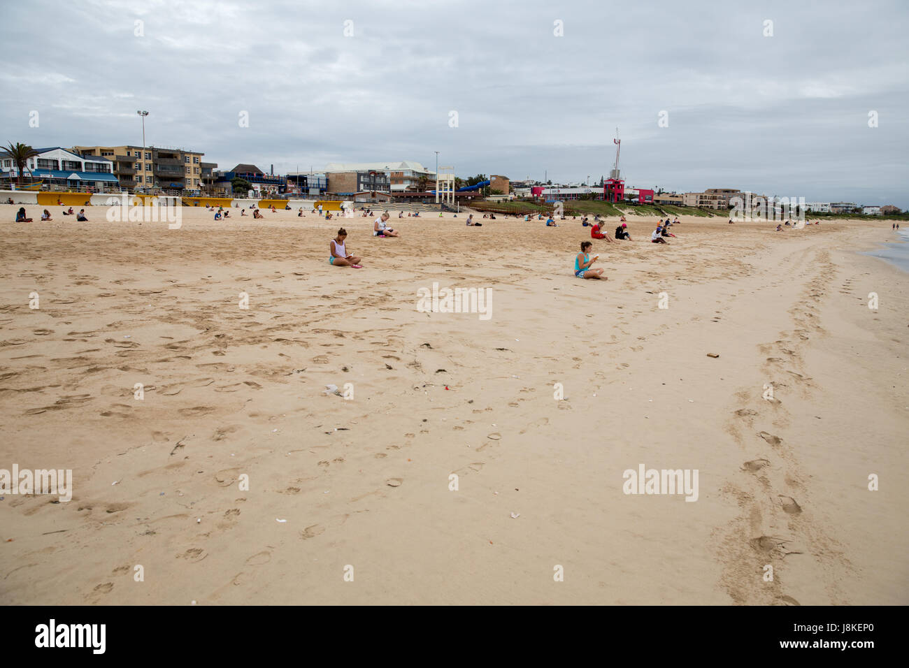 Jeffry's Bay, South Africa - 27 JANUARY 2015: Kids studyng at the beach