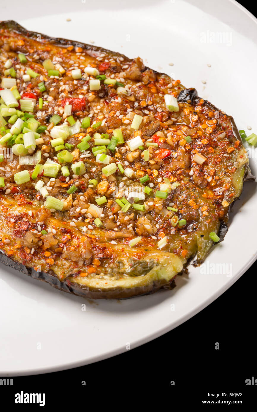 A Plate of Chinese BBQ on Black Background. Eggplant Stock Photo Alamy