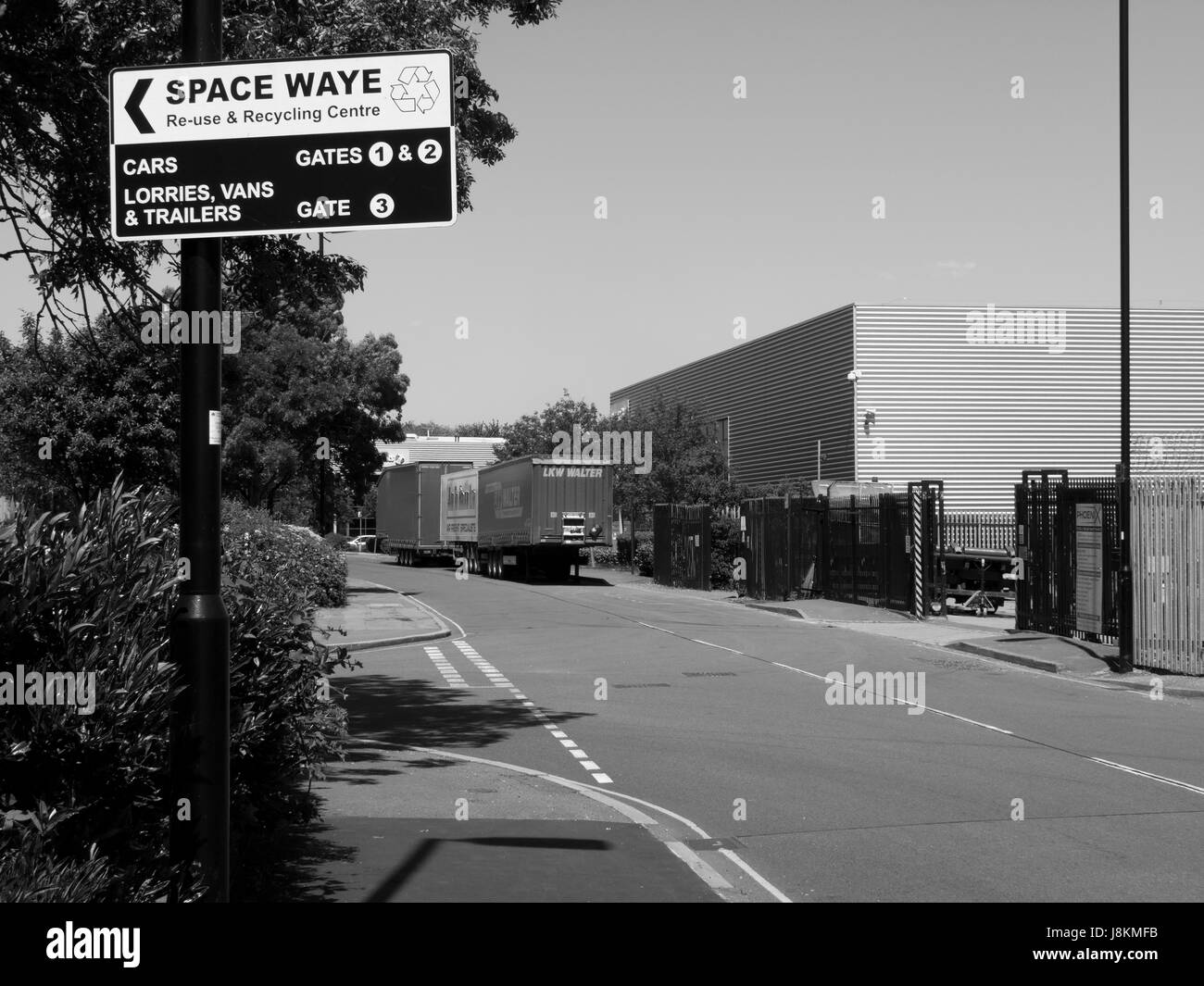 Space Waye recycling centre roadside direction sign mounted on lamppost Stock Photo