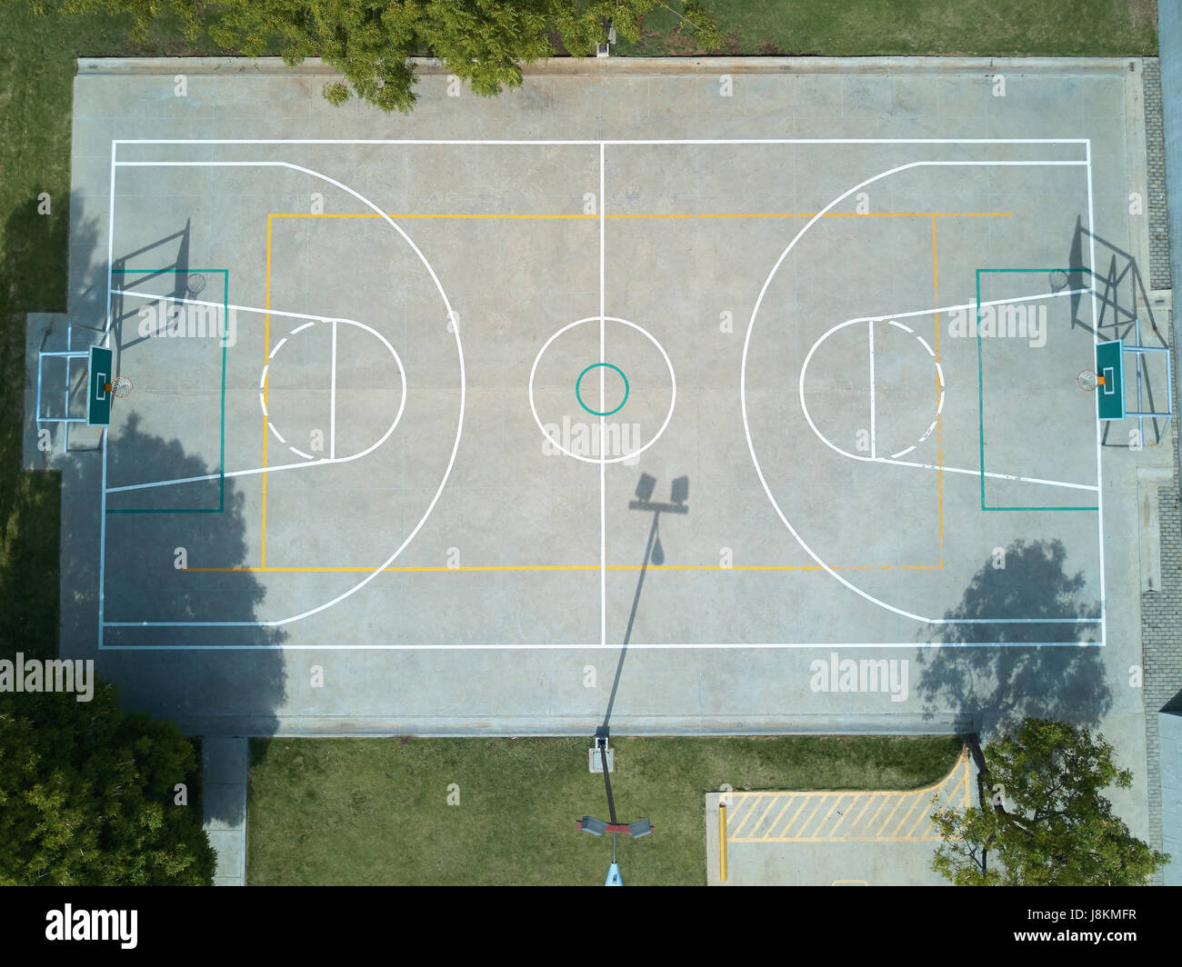 Basketball field aerial view on day time. Sport court above view from drone Stock Photo