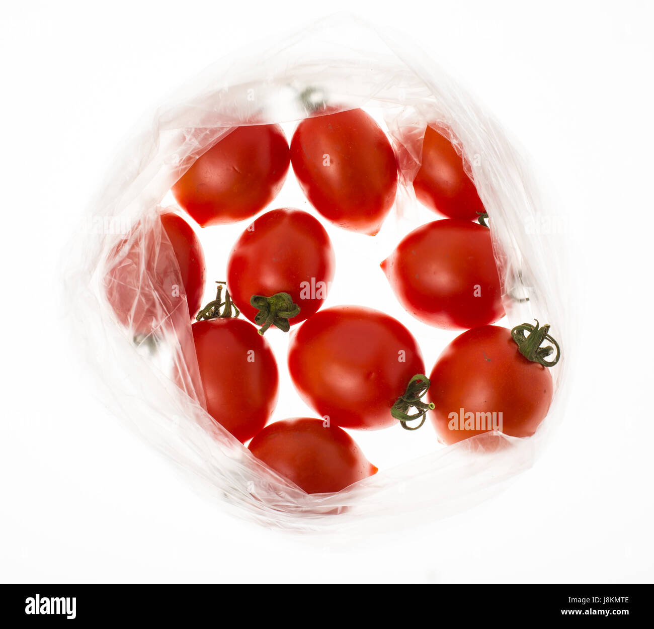 Small red tomatoes in the package Stock Photo Alamy