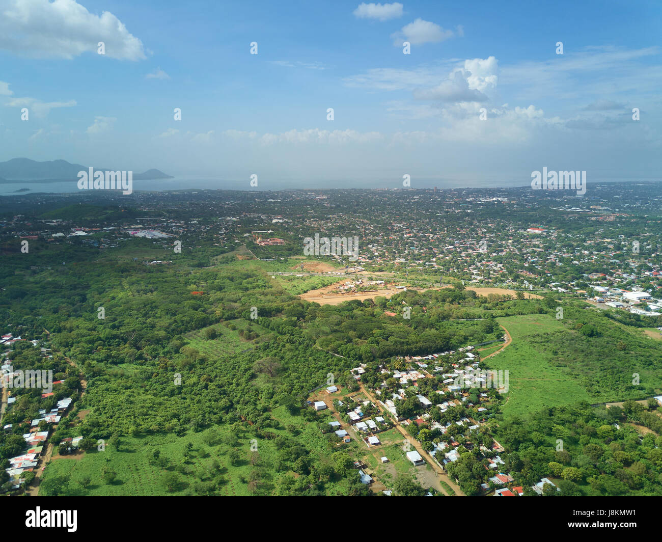 Managua city cityscape aerial day view. Green wide city Managua. Panorama of Managua city Nicaragua Stock Photo