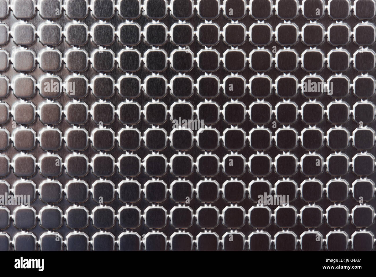 Steel shiny metal background. Pattern on stainless metal surface Stock