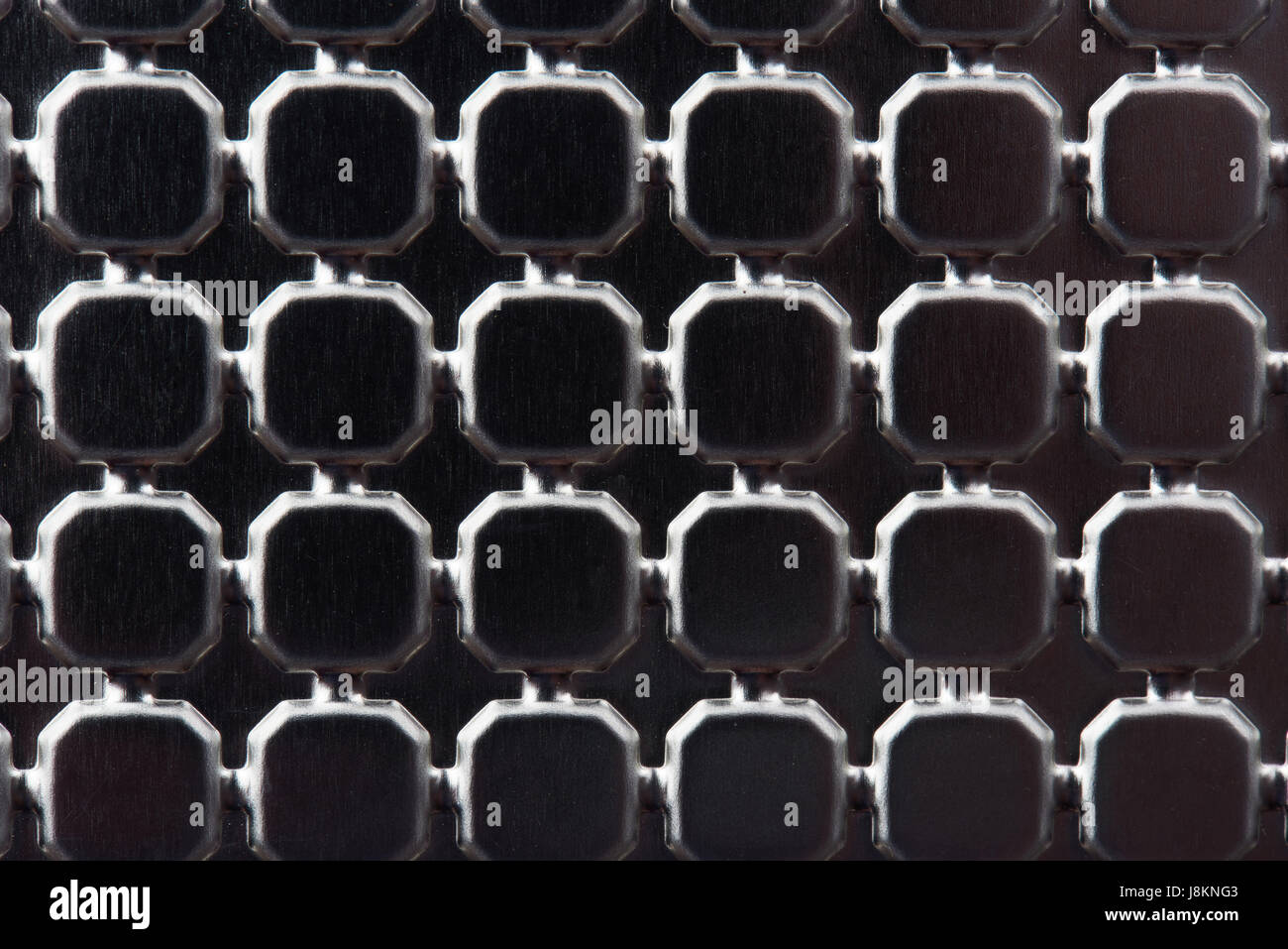 Chrome metal surface close-up. Design on metal shiny texture Stock Photo
