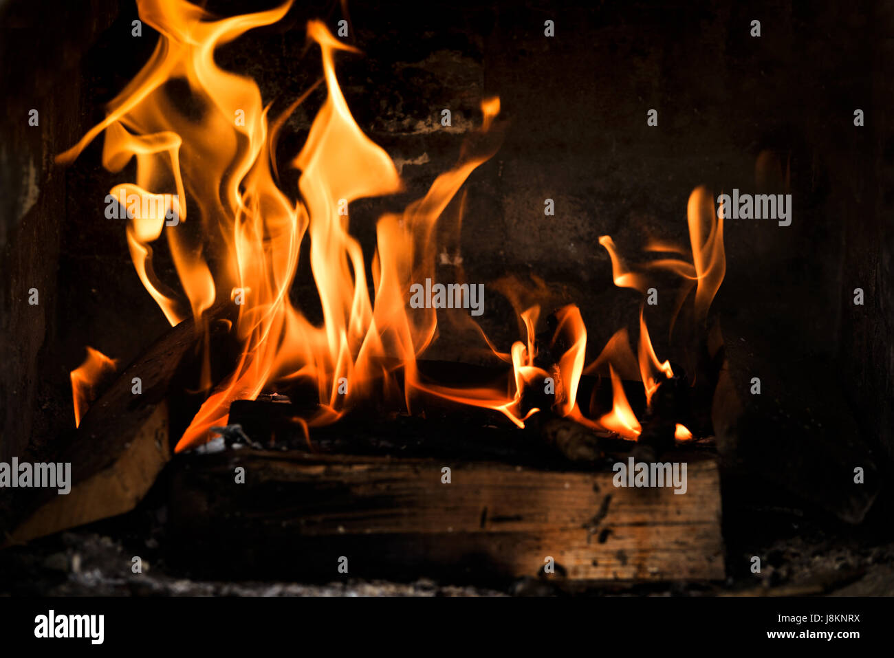 Intense flames and burning trees in the fireplace Stock Photo Alamy