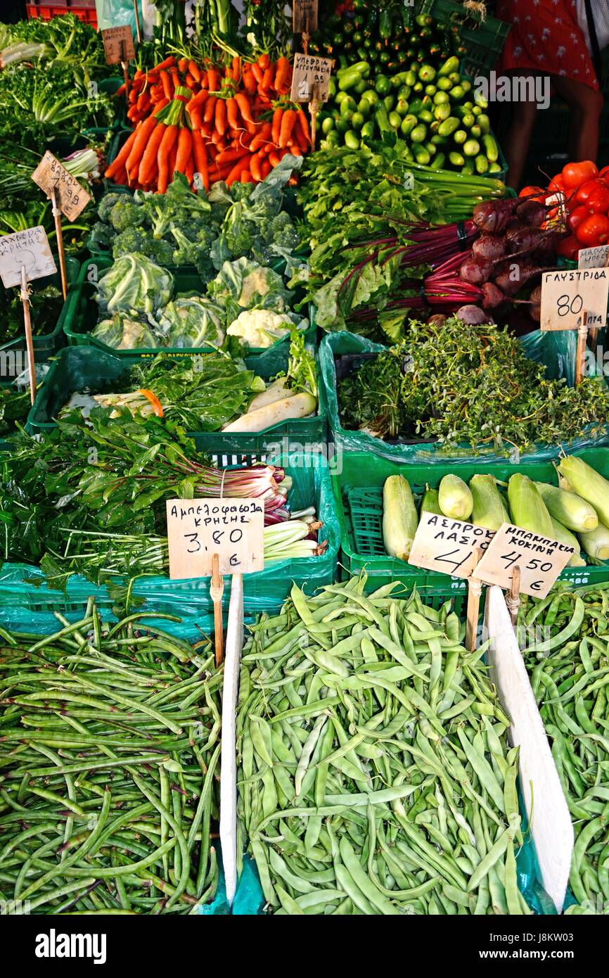 Fresh vegetables for sale on a market stall in the city centre