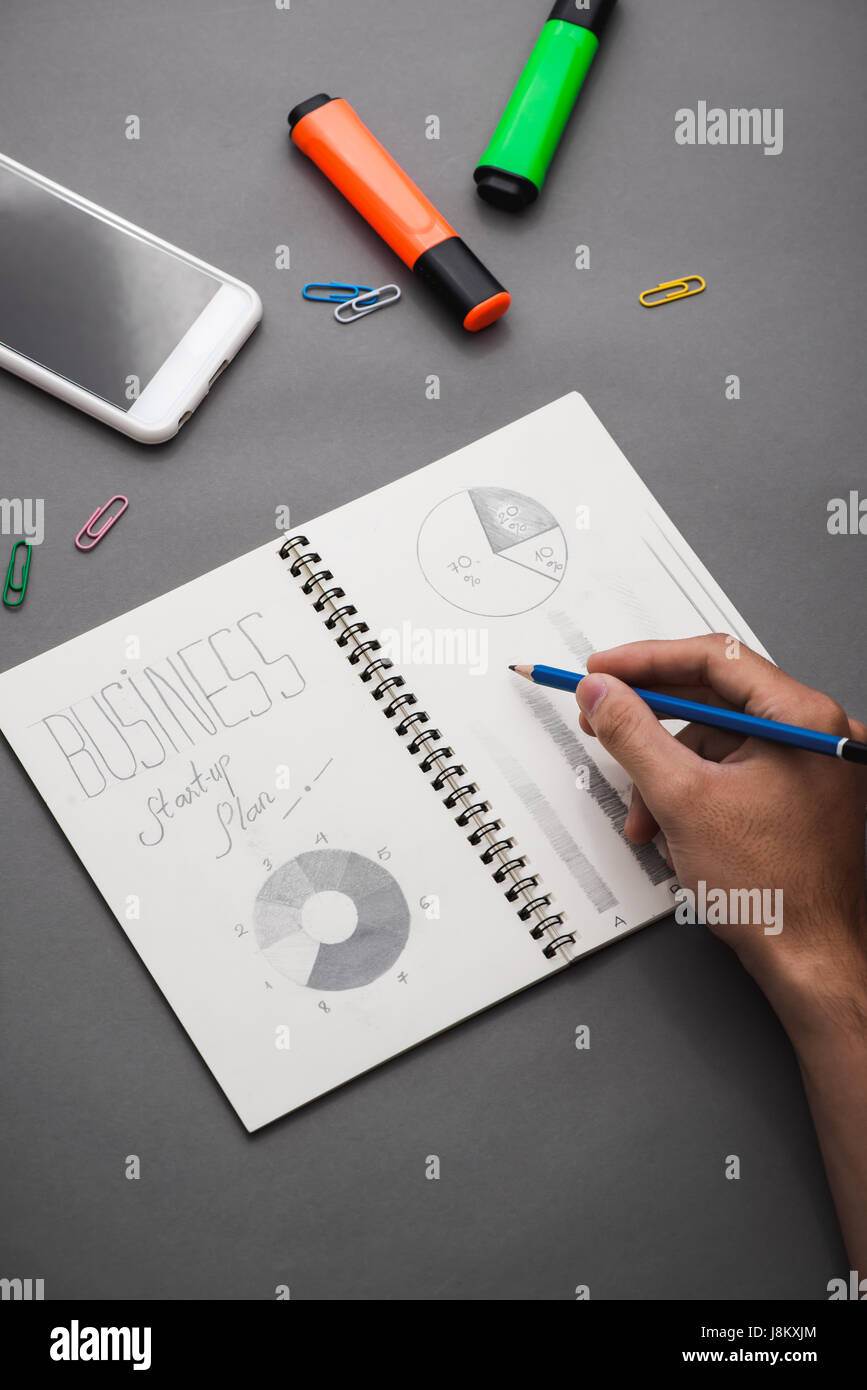 Business concept. Businessman writing idea sketch Stock Photo