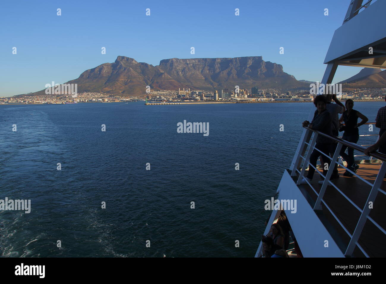 Cape Town South Africa - passengers on the aft deck of a cruise liner watch the departure from Table Bay Harbortravel,wanderlust,road,trip,explore,dis Stock Photo