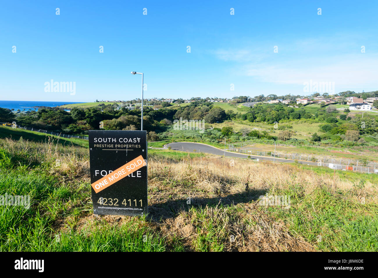 Sign for plots of land for Sale along the coast, South of Kiama, Illawarra Coast, New South Wales, NSW, Australia Stock Photo