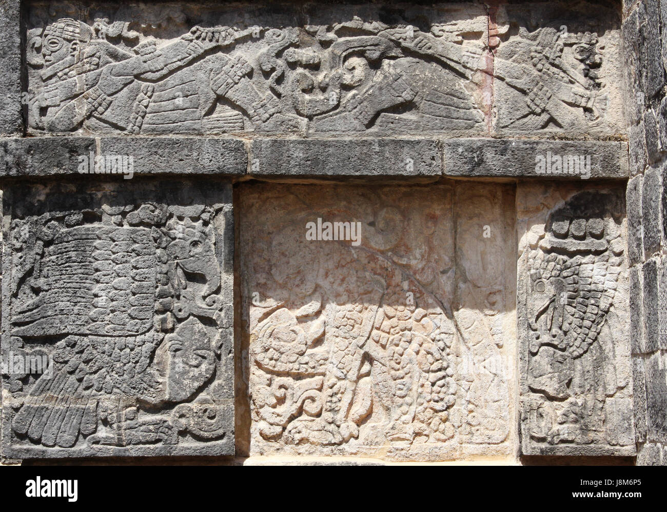 Bas-relief carving of a jaguar, eagle and lying mayan warriors,  pre-Columbian Maya civilization, Chichen Itza, Yucatan, Mexico. UNESCO  world heritage Stock Photo - Alamy