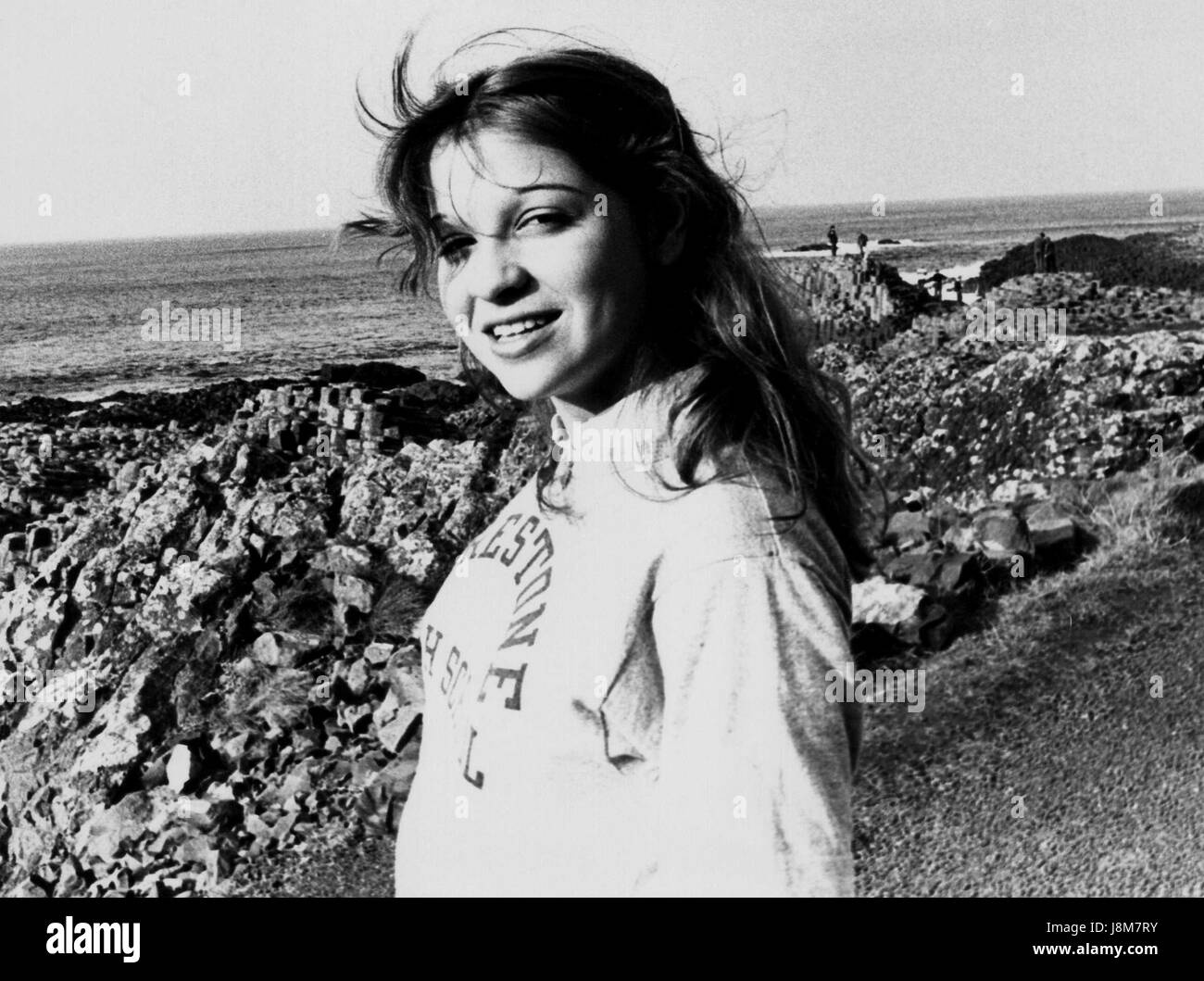 Rachel Sweet, U.S. pop singer, poses by the coast in Northern Ireland on October 29, 1978. She was part of the Be Stiff tour run by her label Stiff Records. Stock Photo