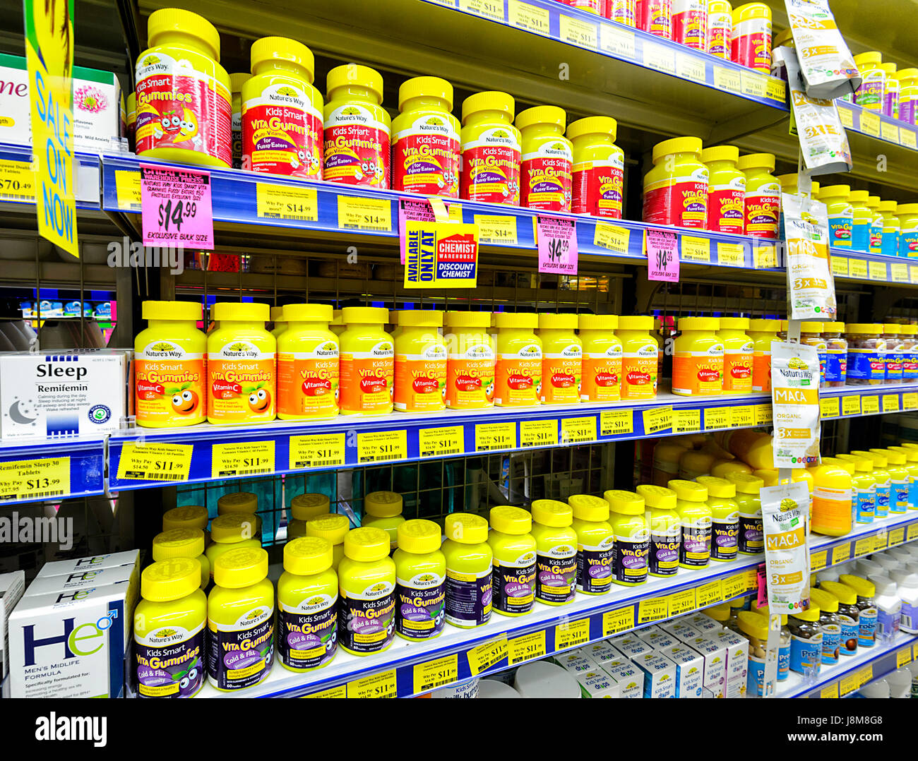 Vitamins jars on shelves at Chemist Warehouse, a discount chemist store, Shellharbour, New South Wales, NSW, Australia Stock Photo
