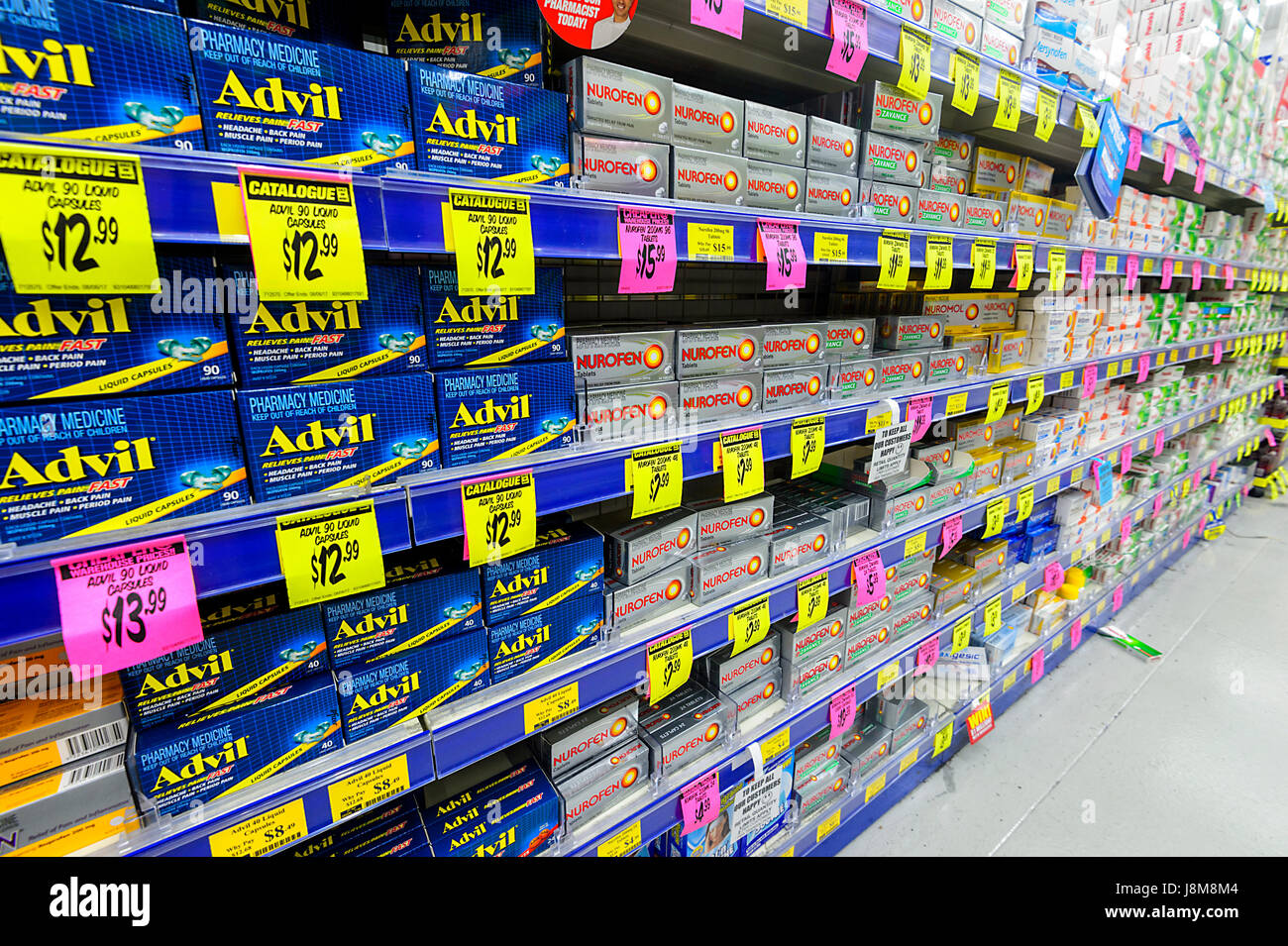 Boxes on painkiller tablets stacked on shelves at Chemist Warehouse, a discount chemist store, Shellharbour, New South Wales, NSW, Australia Stock Photo