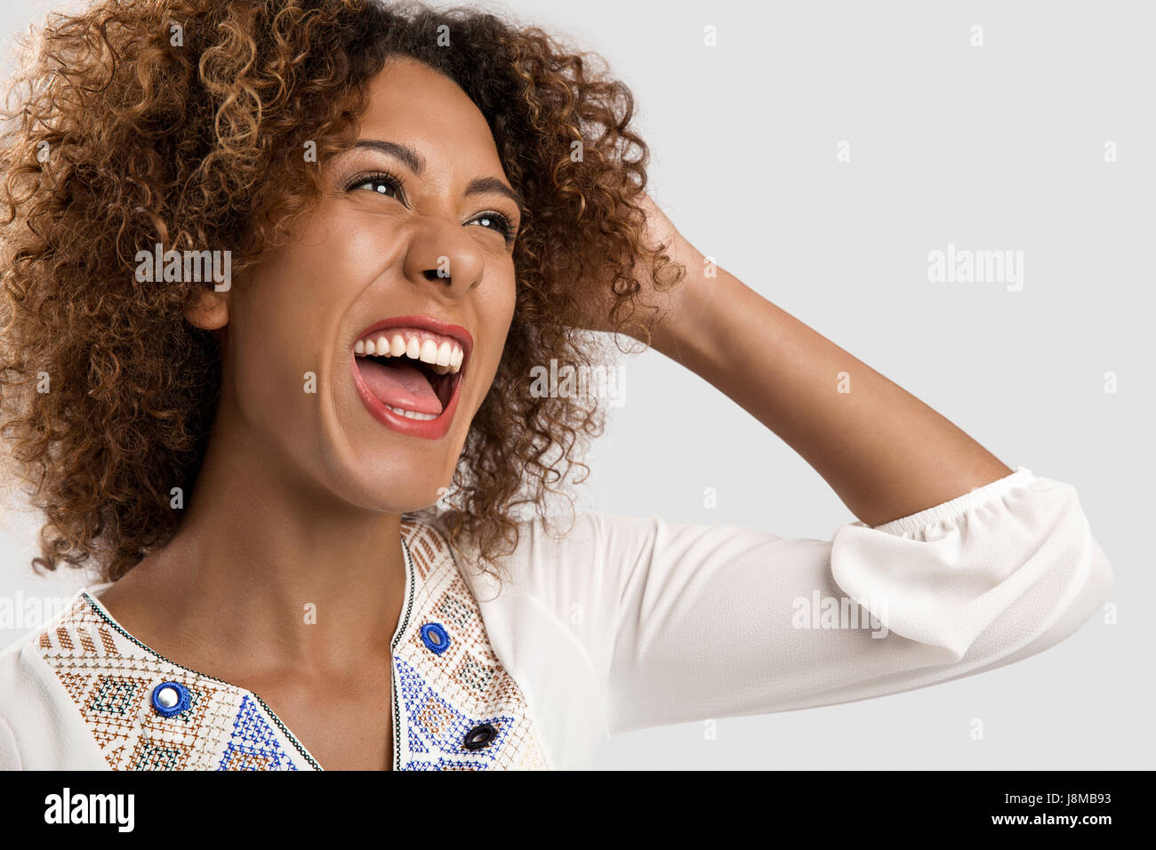 Portrait of a beautiful African American woman laughing Stock Photo - Alamy