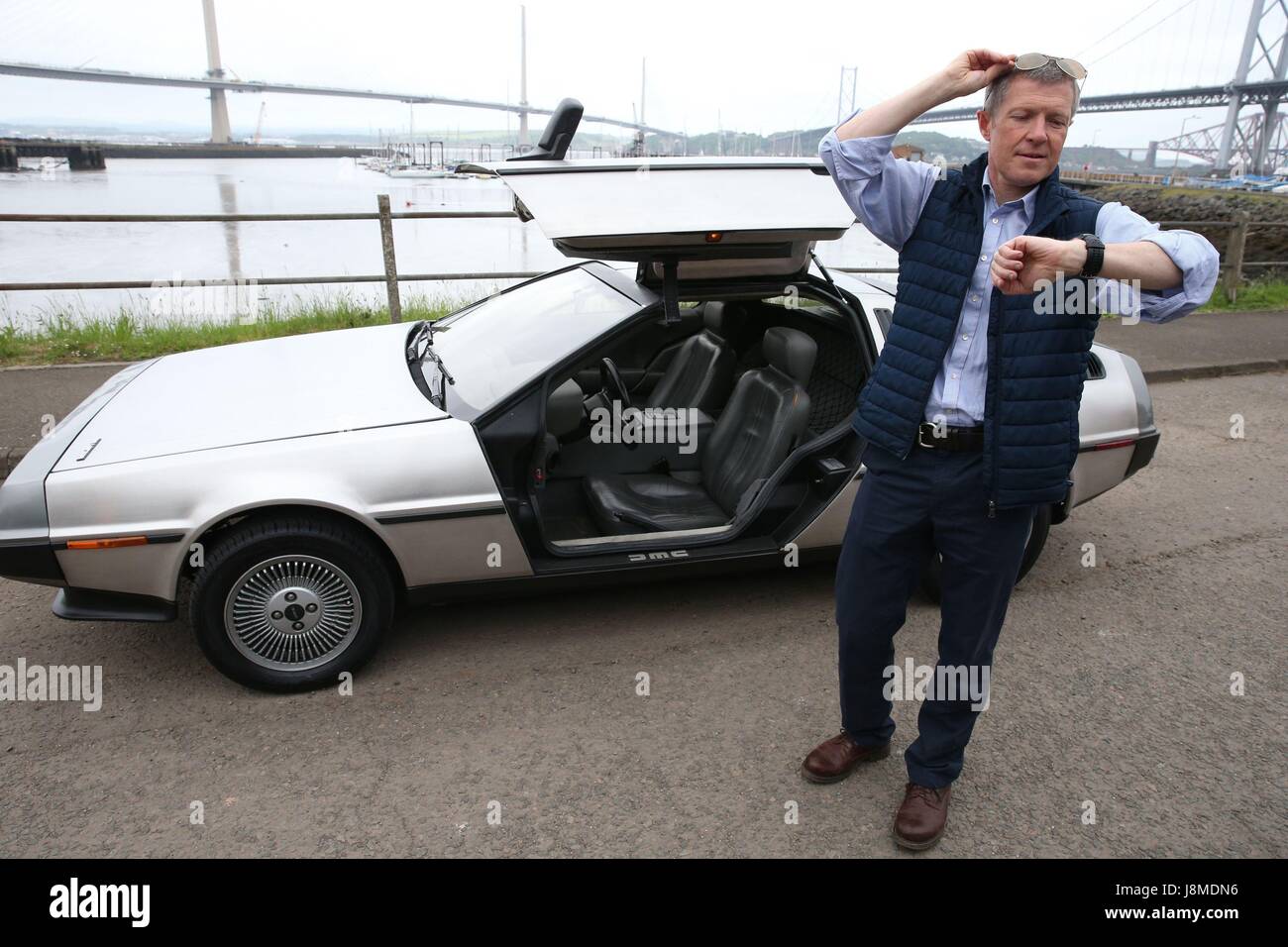 Scottish Liberal Democrat leader Willie Rennie with a 'Back to the Future' DeLorean during a General Election campaign visit to South Queensferry. Stock Photo