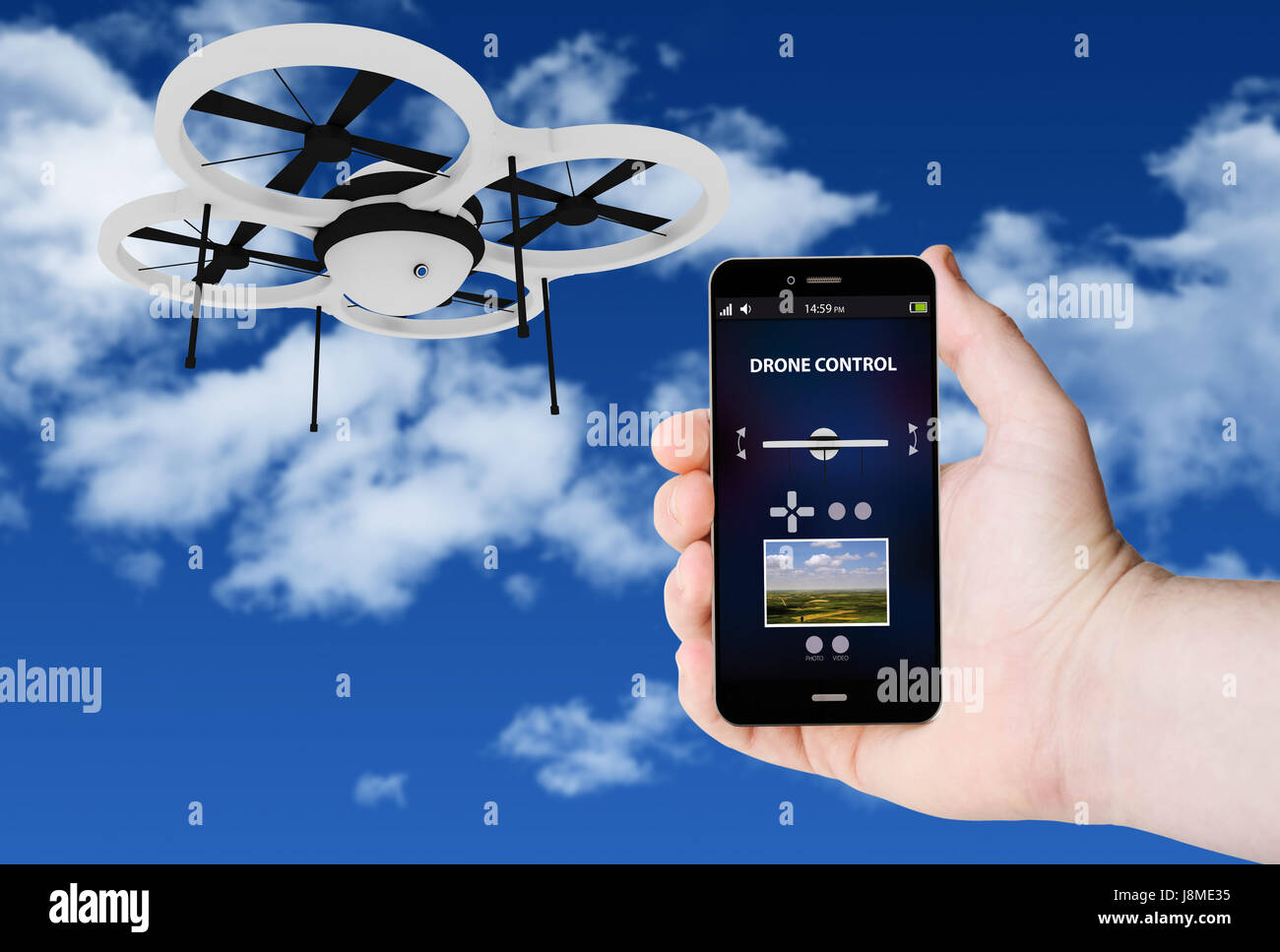 Hand hold a phone with drone control on a screen on the background of a