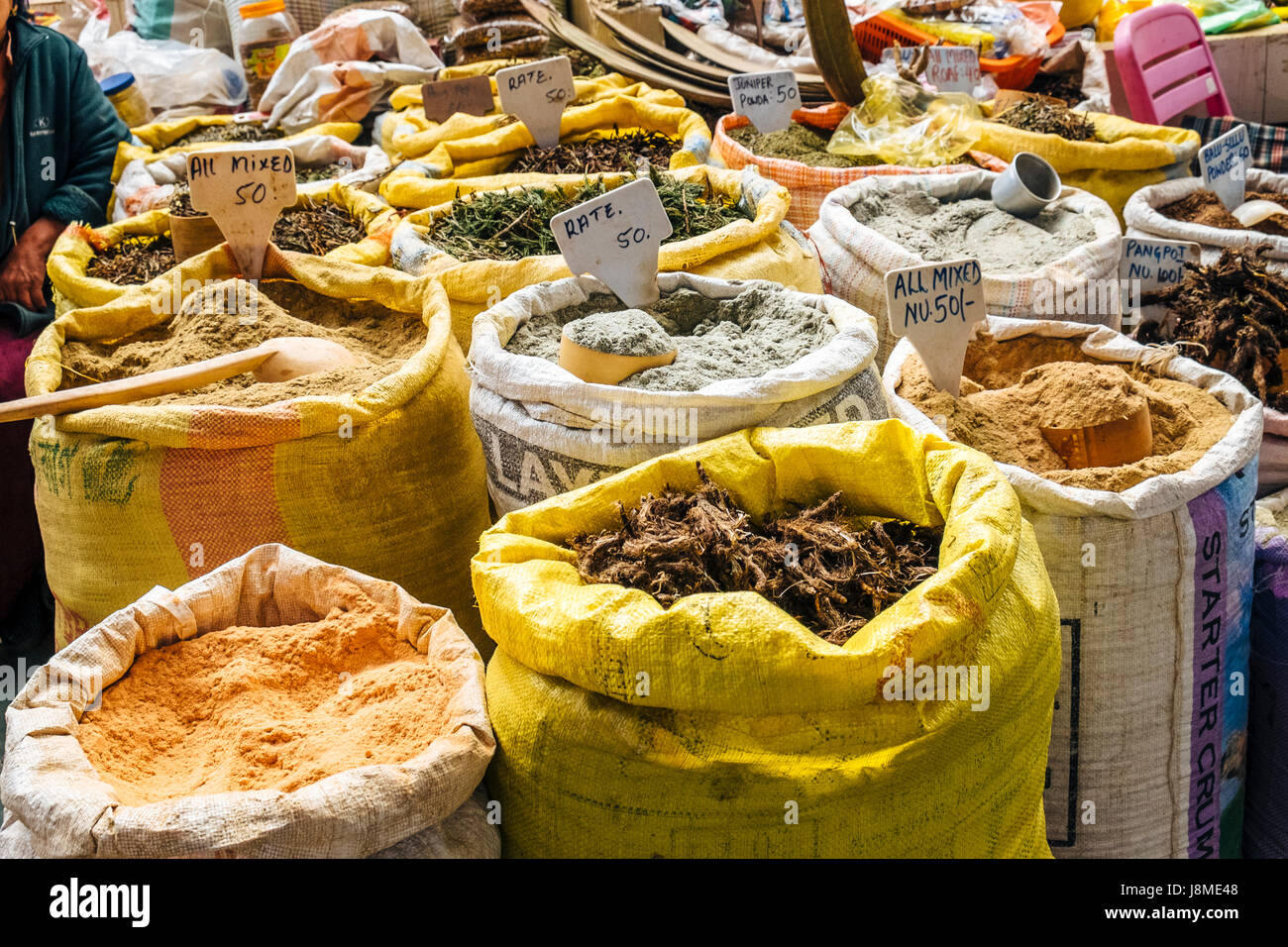 Gunny sacks of grind medicinal herbs and plant resins to use as incense