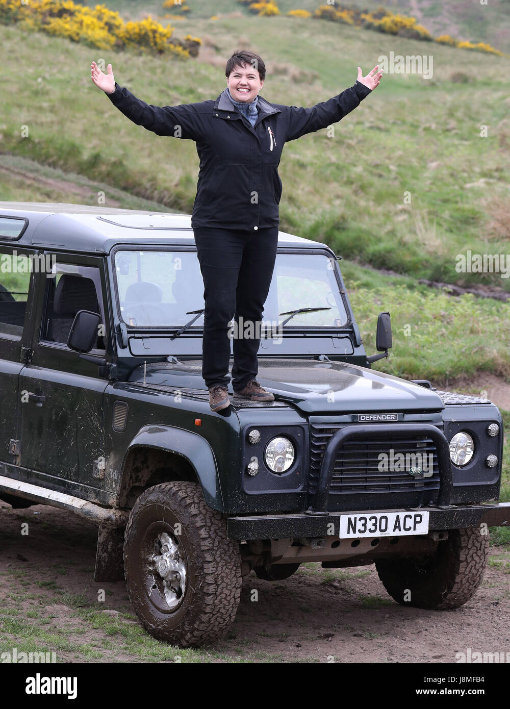 Scottish Conservative leader Ruth Davidson stands on the bonnet of a ...
