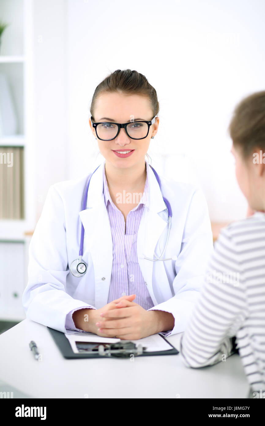 Young female doctor listen to patient story carefully. Medical and