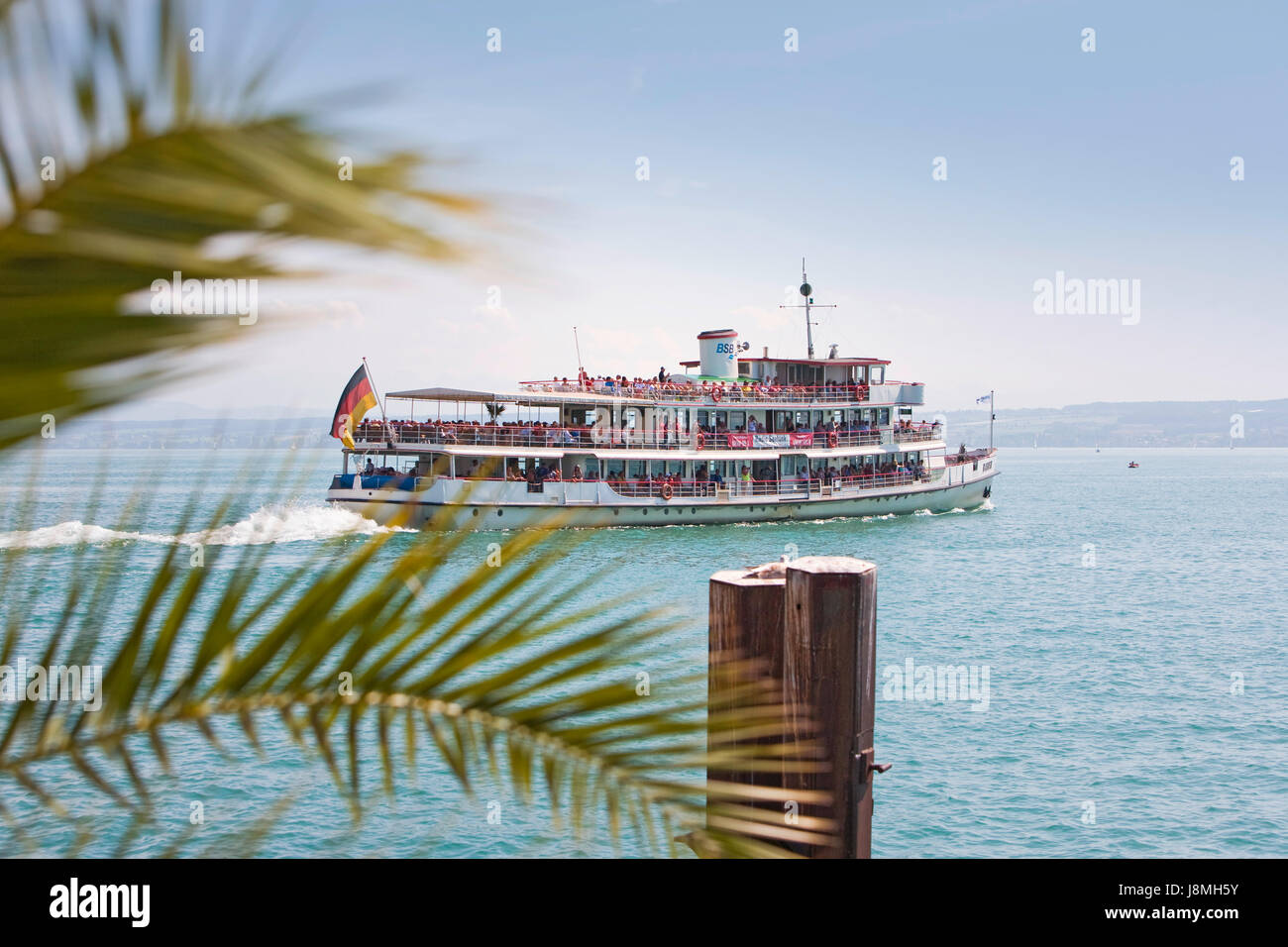 Excursion boat leaves, port of Meersburg, Lake Constance. Stock Photo