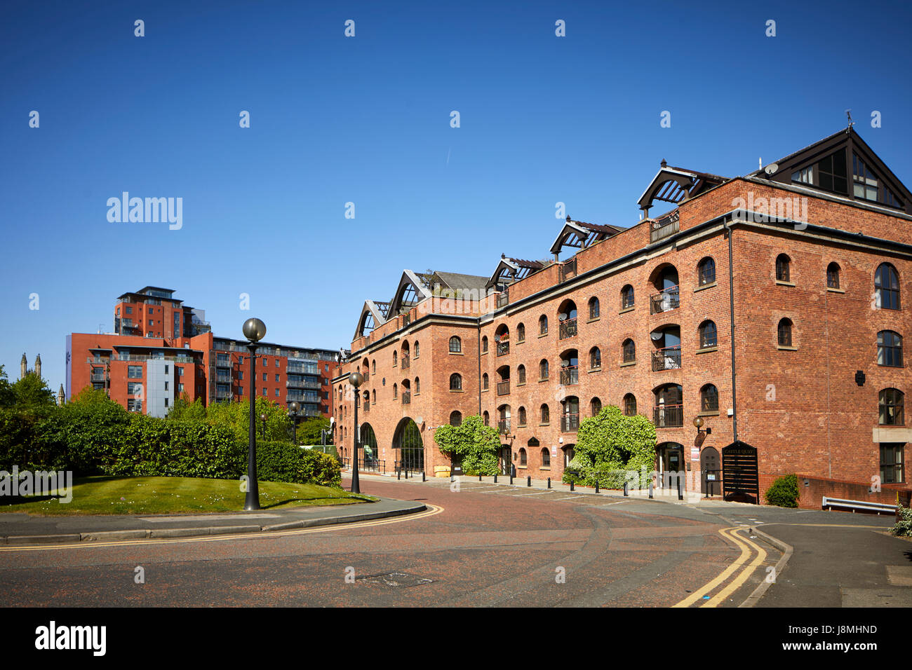 One of the original urban city living mill conversions into lofts, Castle Quay development mill Castlefield , Gtr Manchester, UK. Stock Photo