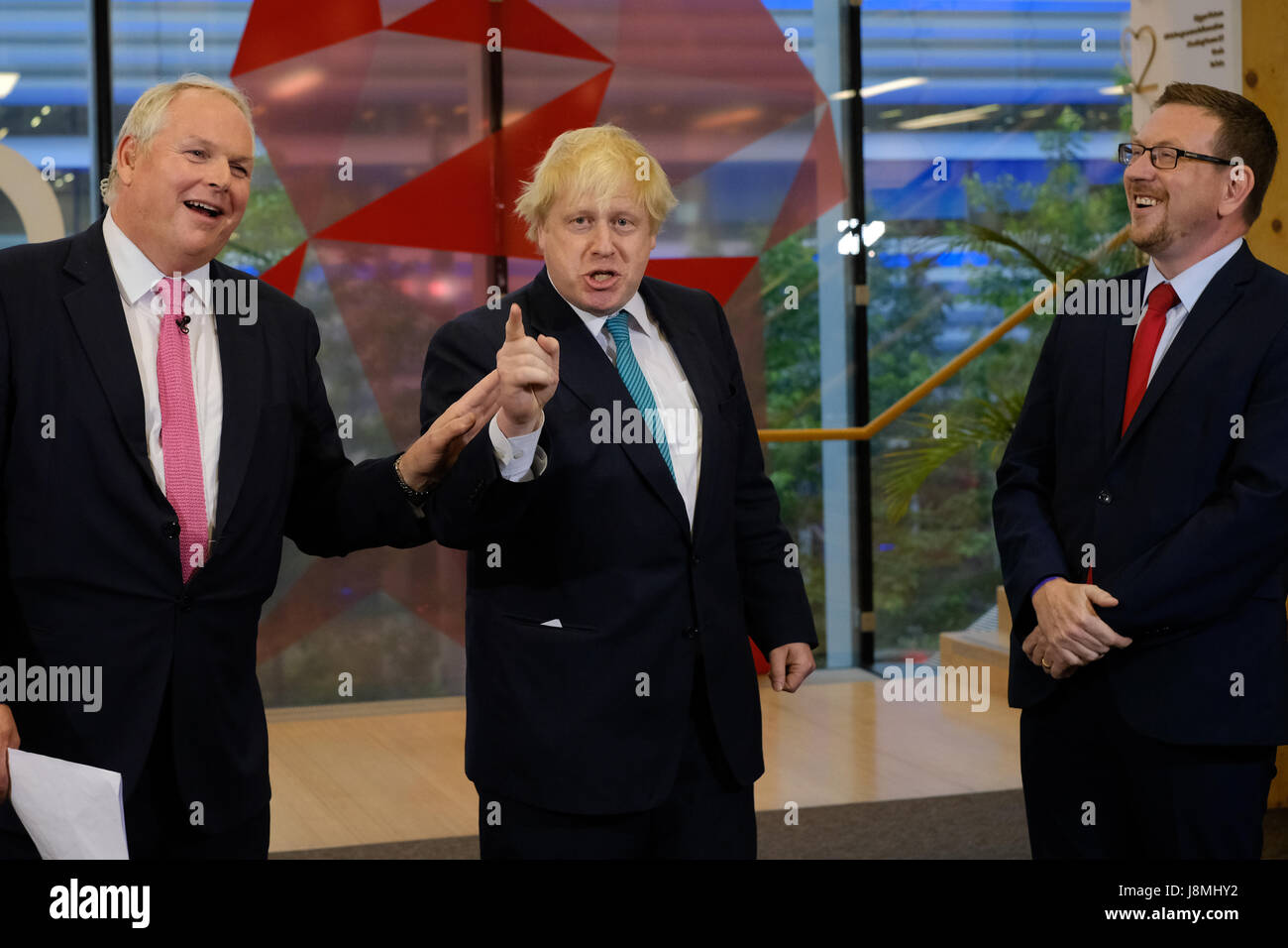 Sky News editor at large Adam Boulton (left) interviews Foreign Secretary Boris Johnson (centre) and Labour MP Andrew Gwynne at Sky studios in Osterley, west London, ahead of a joint Channel 4 and Sky News general election show. Stock Photo