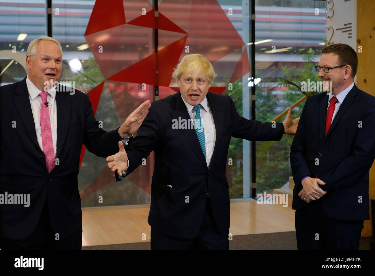 Sky News editor at large Adam Boulton (left) interviews Foreign Secretary Boris Johnson (centre) and Labour MP Andrew Gwynne at Sky studios in Osterley, west London, ahead of a joint Channel 4 and Sky News general election show. Stock Photo