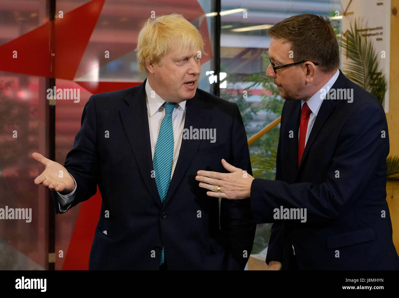 Foreign Secretary Boris Johnson (left) and Labour MP Andrew Gwynne take part in a Sky News programme at Sky studios in Osterley, west London, ahead of a joint Channel 4 and Sky News general election show. Stock Photo