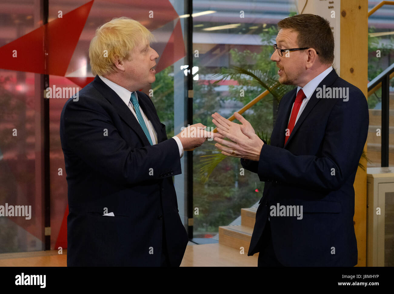 Foreign Secretary Boris Johnson (left) and Labour MP Andrew Gwynne take part in a Sky News programme at Sky studios in Osterley, west London, ahead of a joint Channel 4 and Sky News general election show. Stock Photo