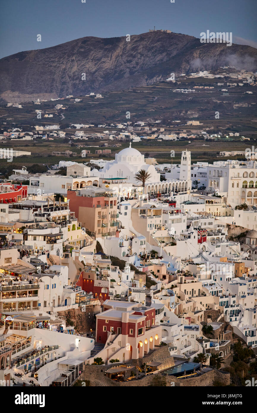 Volcanic Greek island Santorini one of the Cyclades islands in the Aegean Sea. Fira cityscape the islands capital. mountain of Profit Elias, in backgr Stock Photo