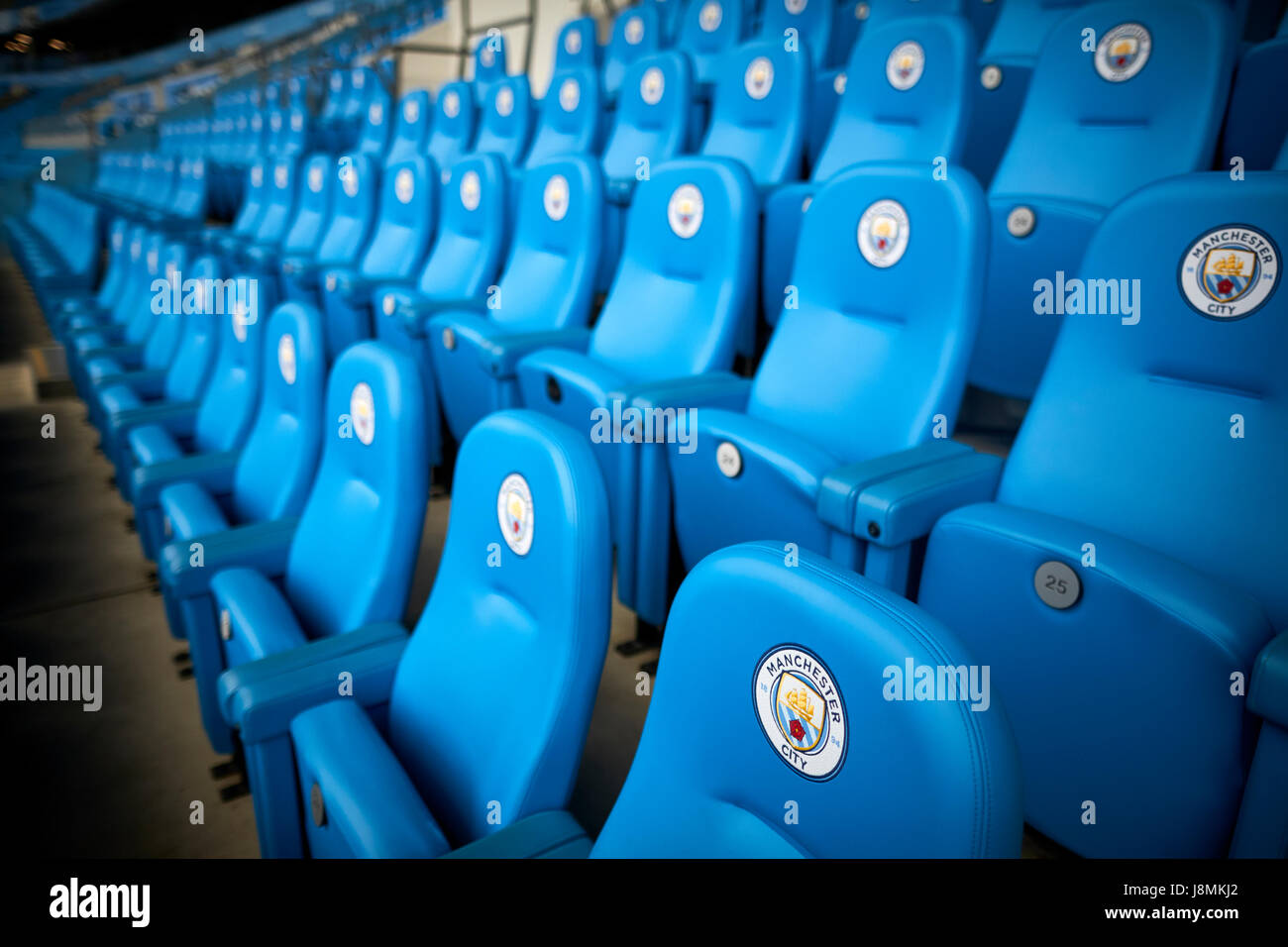 Manchester City Etihad Stadium  posh seats with round logo. Stock Photo