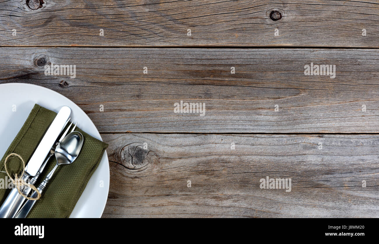 Vintage table setting on rustic wood Stock Photo - Alamy