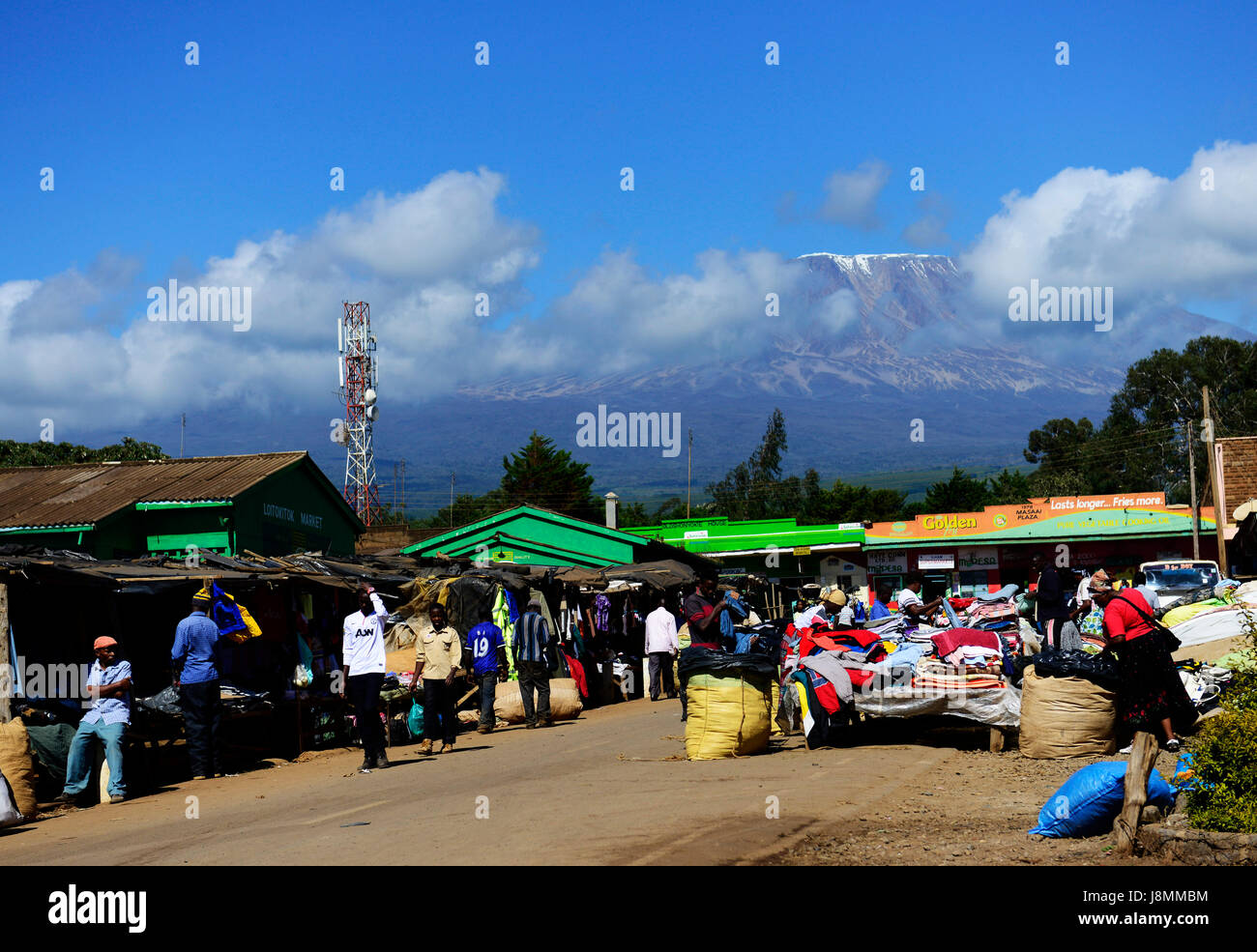 Used cloth sold at the colorful market in the border town of Loitokitok in Kenya. Stock Photo