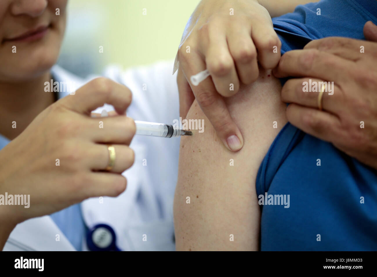 Annual vaccination campaign against influenza in a public health office at Sao Paulo city. This year with three serotypes: H1N1, H3N2 and Influenza B. Stock Photo