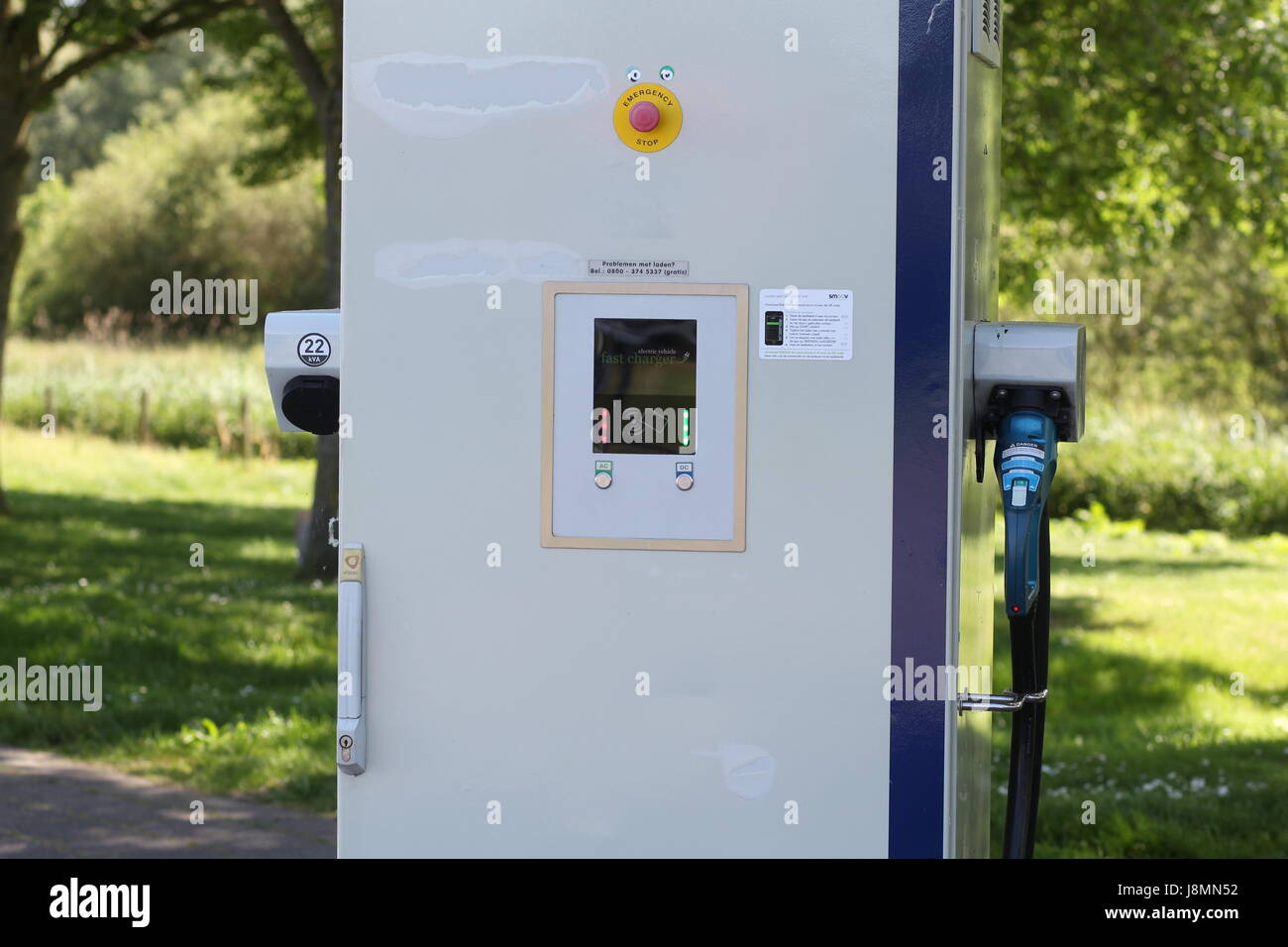 Electric vehicle charging station in the Netherlands. Stock Photo
