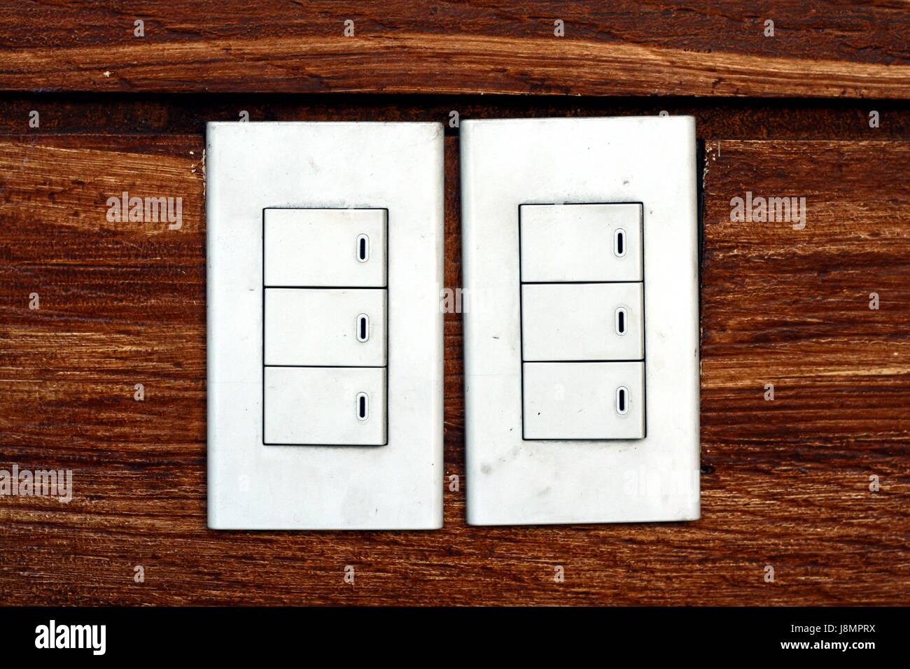 Photo of light switches on a concrete wall Stock Photo - Alamy