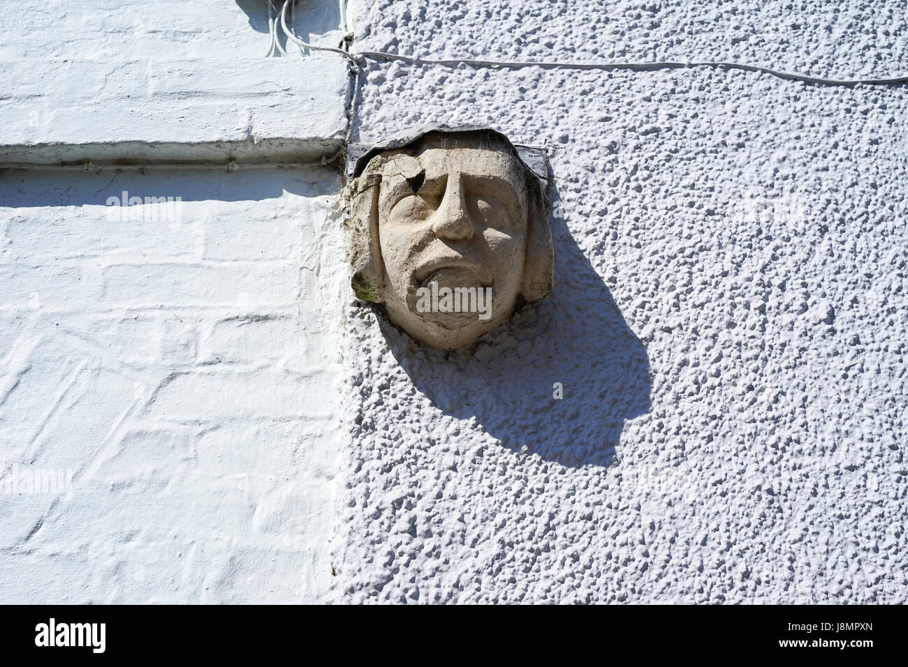 A Chimera  on a house wall in Ludlow, Shropshire, UK. Stock Photo