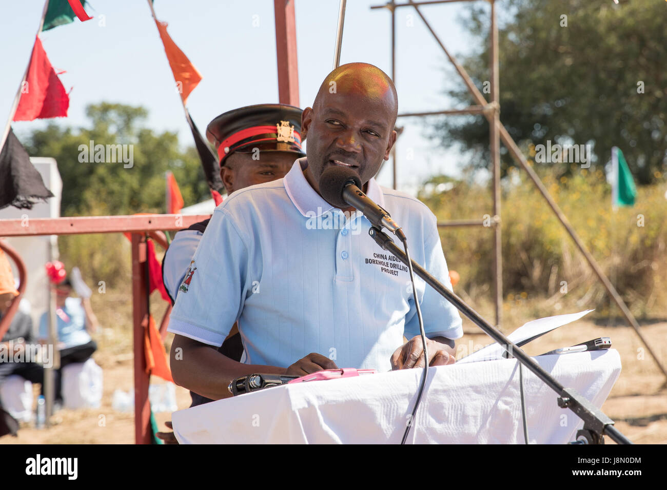 Lusaka, Central Province. 28th May, 2017. Zamiba's Minister of Water Development, Sanitation and Environmental Protection Lloyd Kaziya speaks at a handover ceremony of Chinese-funded boreholes in Chisamba district, Central Province, Zamiba on May 28, 2017. The Chinese government on Sunday handed over about 420 boreholes to rural communities to help improve their access to clean water in Zambia's Central province. Credit: Peng Lijun/Xinhua/Alamy Live News Stock Photo