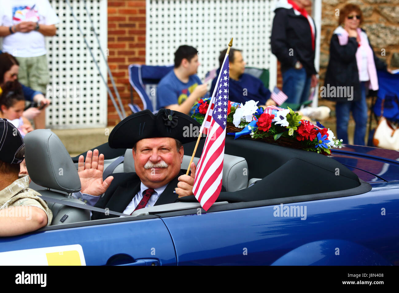 Westminster, Maryland, USA. 29th May, 2017. A veteran waves to spectators while taking part in parades for Memorial Day, a federal holiday in the United States for remembering those who died while serving in the country's armed forces. Credit: James Brunker/Alamy Live News Stock Photo