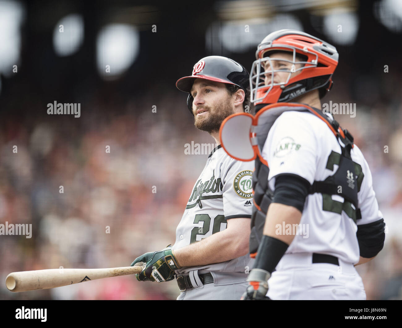 San Francisco, California, USA. 29th May, 2017. Washington Nationals second baseman Daniel Murphy (20) and San Francisco Giants catcher Buster Posey (28) watch a high fly go foul, during a MLB baseball game between the Washington Nationals and the San Francisco Giants on Memorial Day at AT&T Park in San Francisco, California. Valerie Shoaps/CSM/Alamy Live News Stock Photo