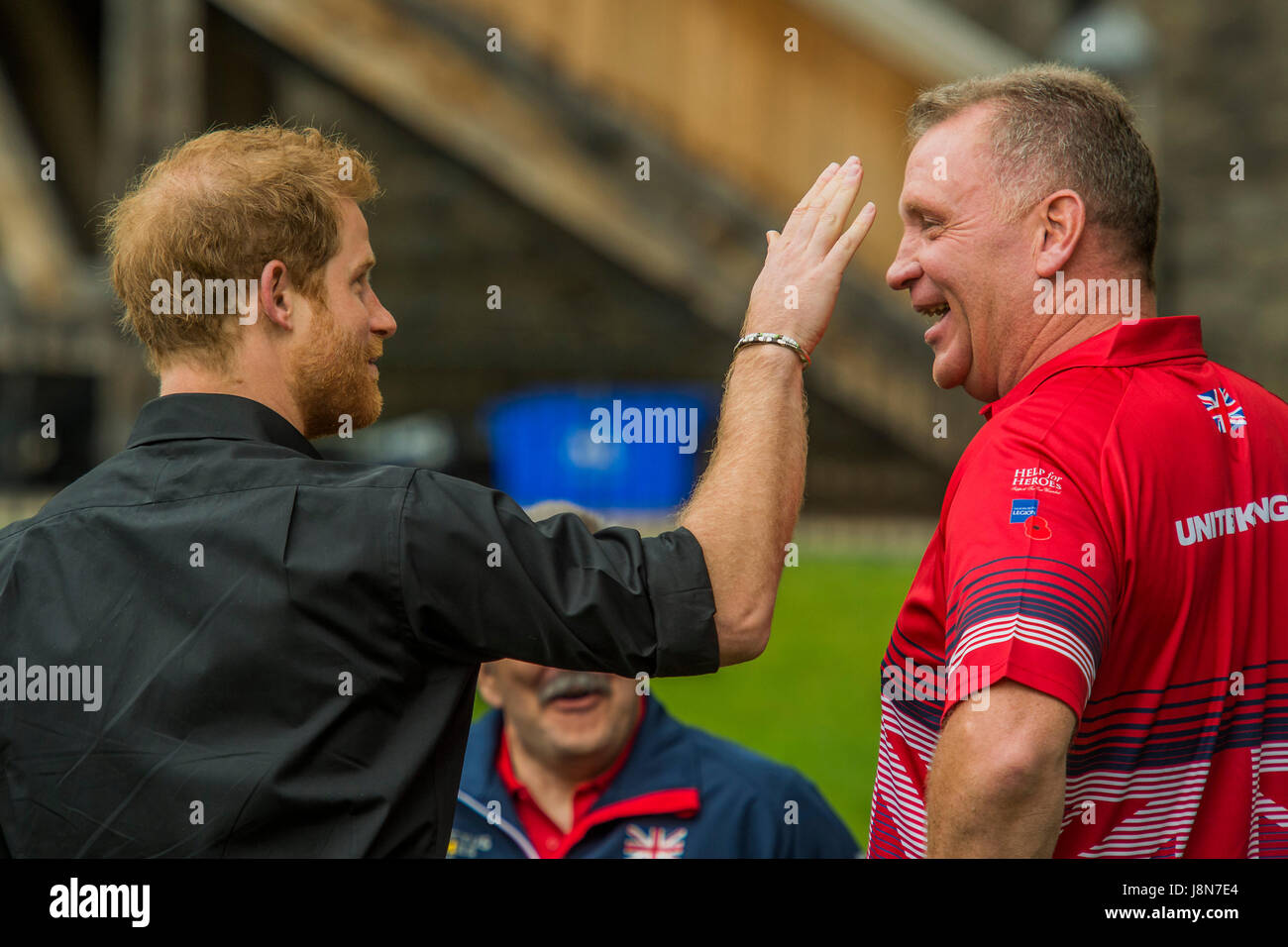 London, UK. 30th May, 2017. Prince Harry shares a joke with team members as he attends the launch of UK team for the Invictus Games Toronto at Tower of London. The Invictus Games was set up for injured soldiers. London 30 May 2017 Credit: Guy Bell/Alamy Live News Stock Photo