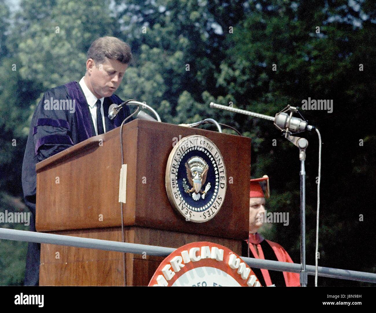 United States President John F. Kennedy speaks at the American University commencement in Washington, D.C.  on June 10, 1963.  This speech is known as Kennedy's 'Pax Americana' speech, where he outlined his vision for world peace.   Credit: Arnie Sachs / CNP /MediaPunch Stock Photo