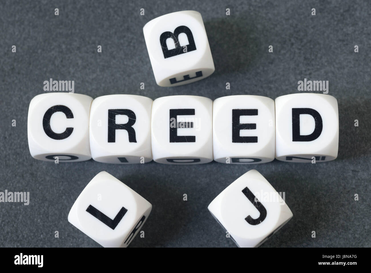 word creed on white toy cubes Stock Photo