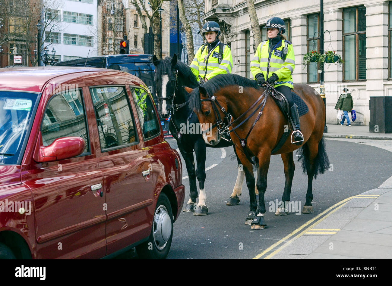 London, UK, 21/03/2017 Police horses on patrol in Charing Cross Rd in