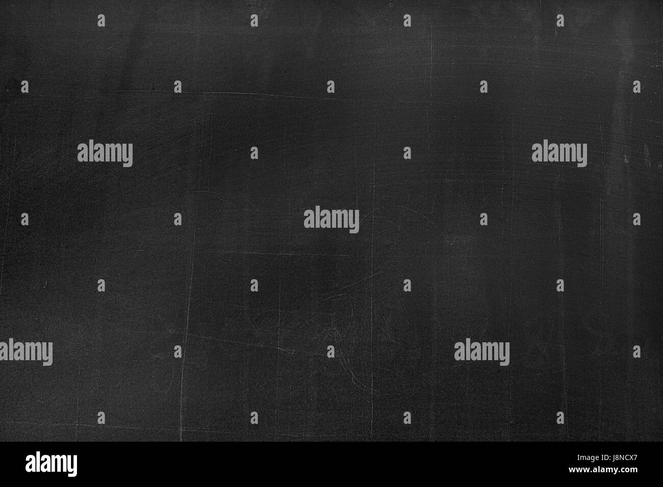 Black board with the traces of chalk over its surface as a background texture Stock Photo Alamy