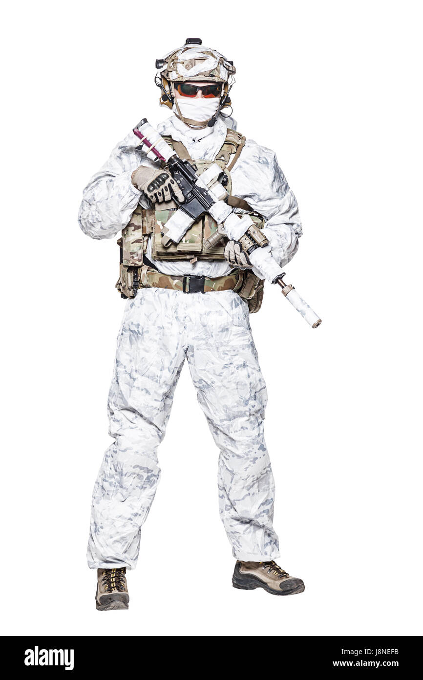 Special forces operator in winter camo clothes Stock Photo