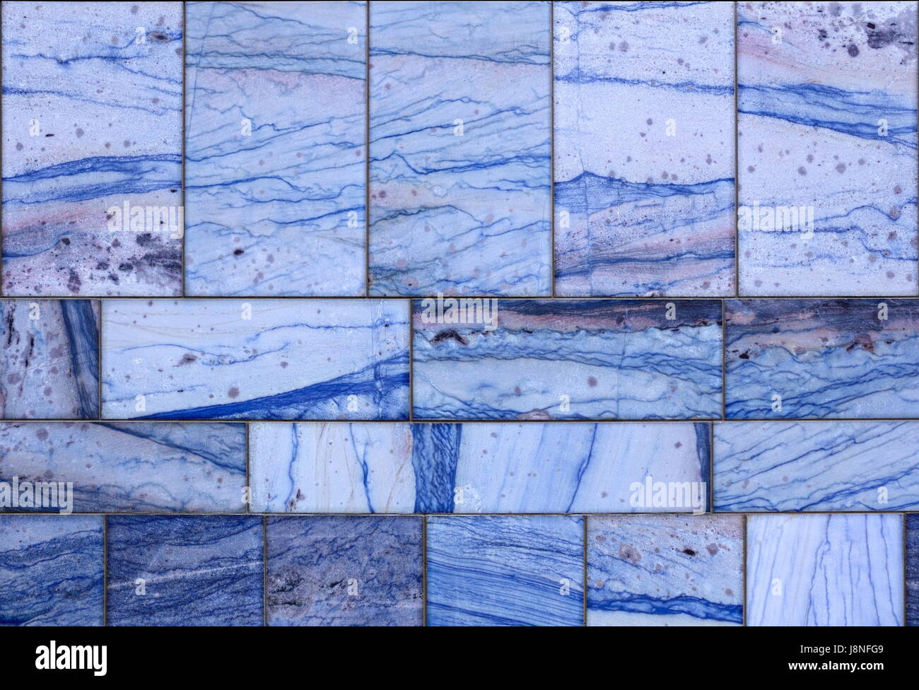 Wall of blue marble tiles usable as background or texture Stock Photo