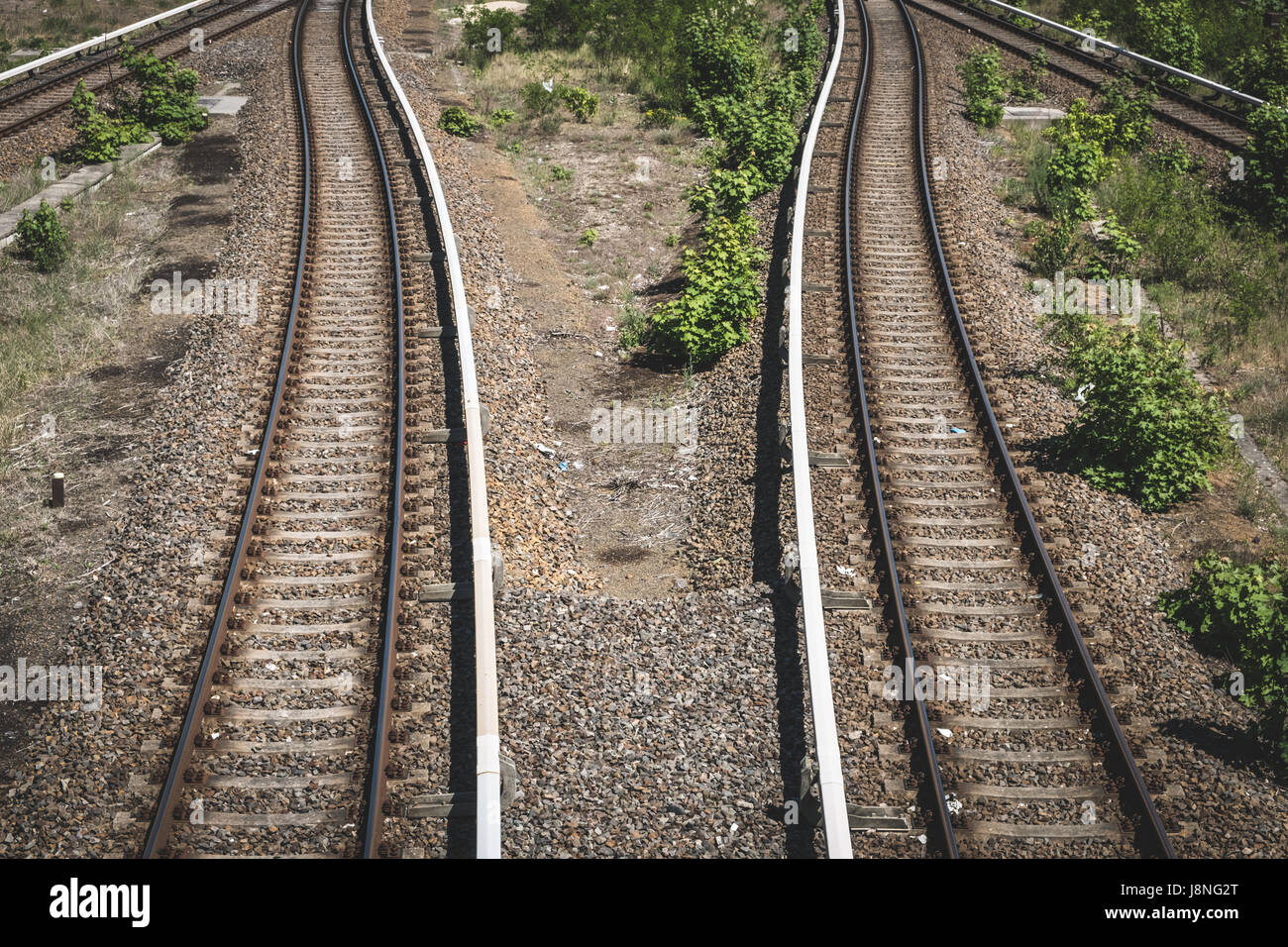 two ways - rails, railway, two railroads splitting Stock Photo